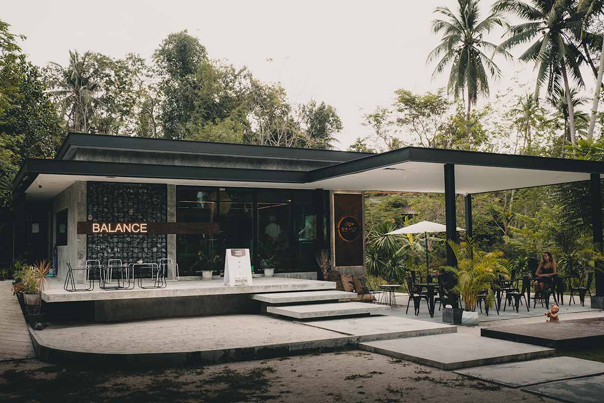 The front entrance and outdoor terrace seating area of Balance Cafe.