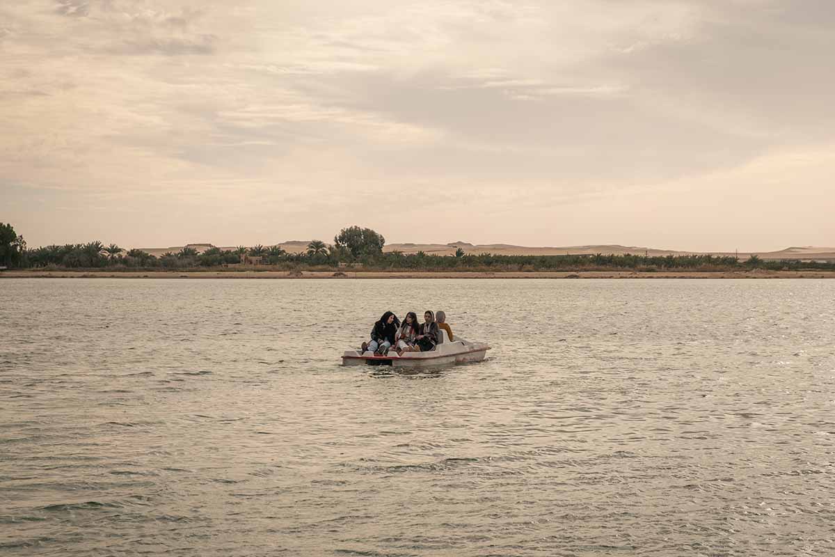 A group of girls on a pedalo in the middle of Fatnas Lake.