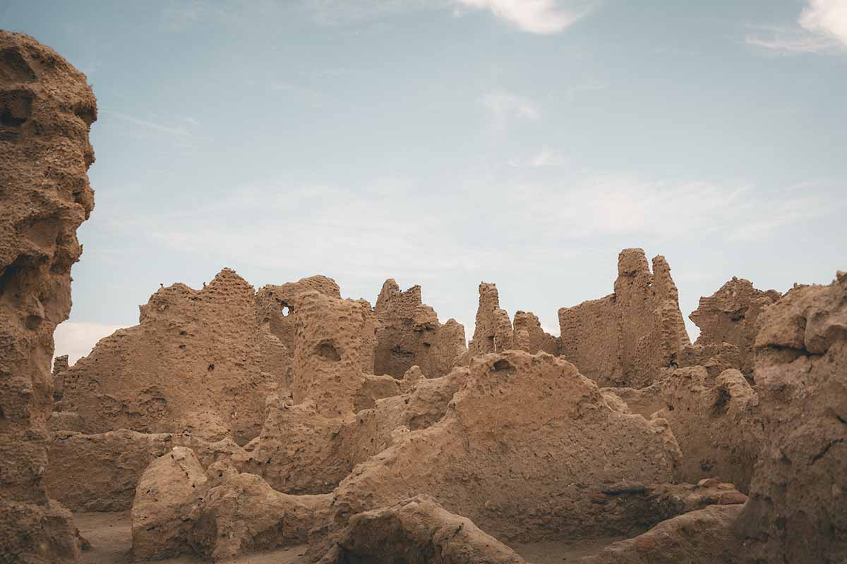 The uniquely shaped ruins of buildings and walls within Shali Fortress.