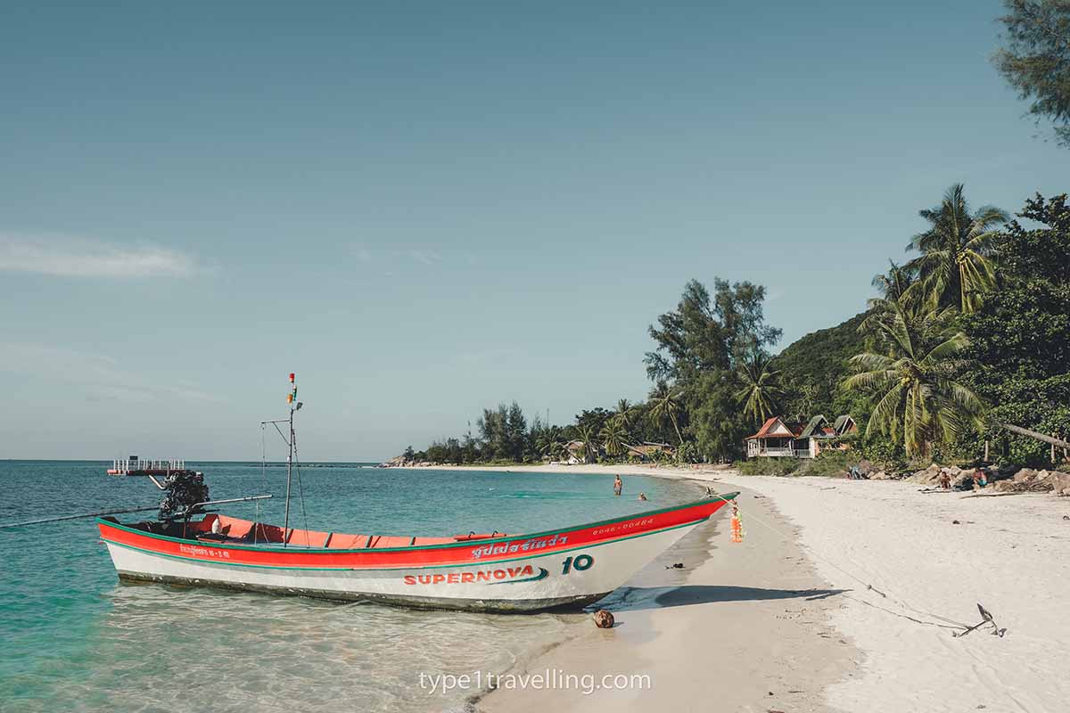 chaloklum-beach A taxi boat docked on the shoreline of Chaloklum Beach.