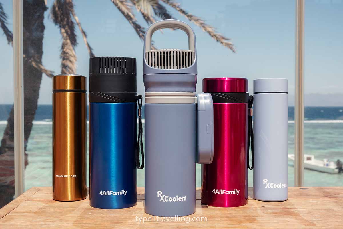 4allfamily-insulin-coolers A lineup of 4AllFamily insulin coolers displayed in various colors and sizes on a countertop.