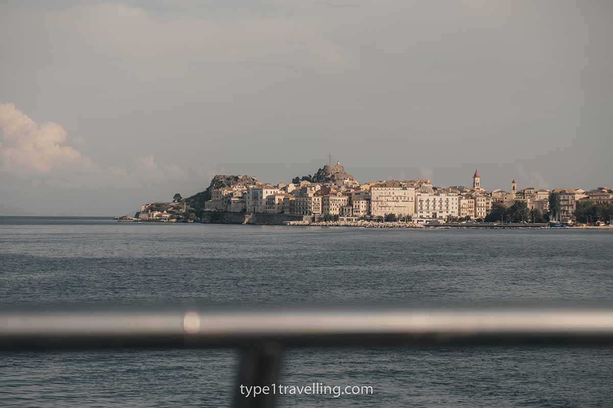 The buildings of Corfu Old Town as seen from a ferry heading towards Saranda.