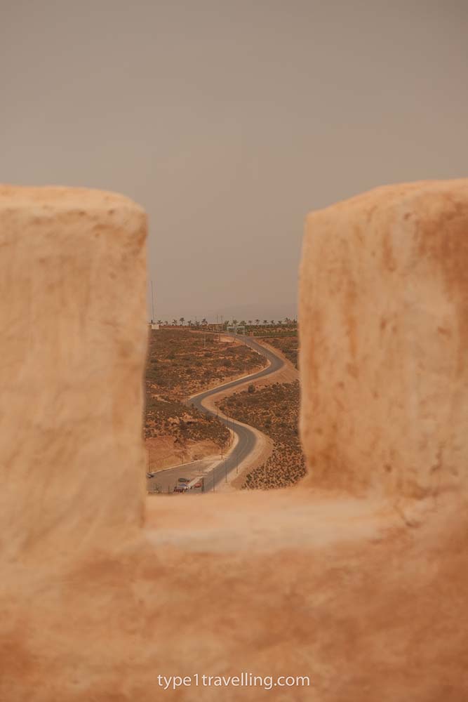 A winding uphill road seen from the ramparts of the Agadir Kasbah.